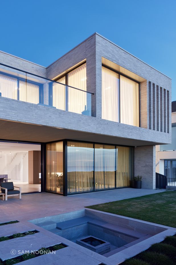 The beachfront with a small plunge pool | Tennyson Residence by Enzo Caroscio Architects