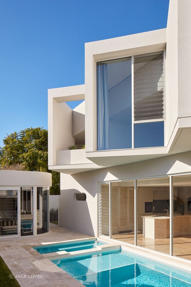 Above, a rooftop garden overlooking Perth city awaits while a glistening pool beckons.