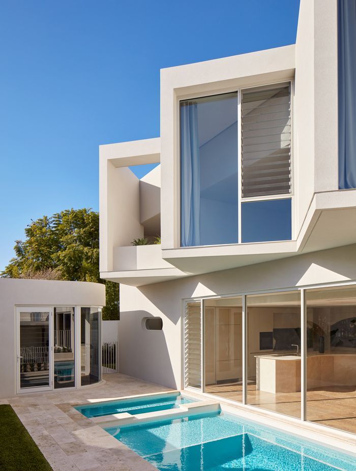 Above, a rooftop garden overlooking Perth city awaits while a glistening pool beckons.