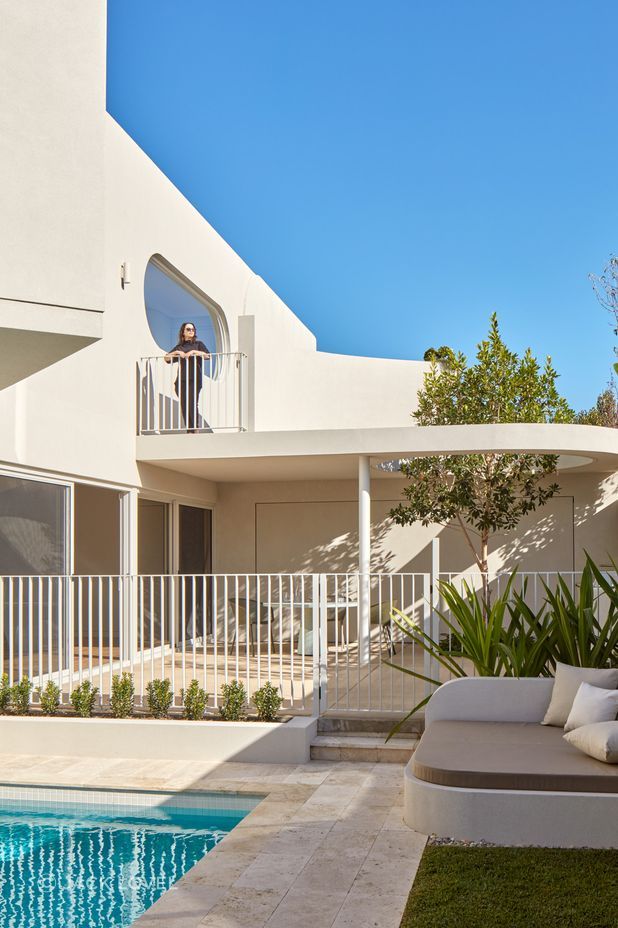 The home unfolds across split levels, each designed for effortless entertaining.