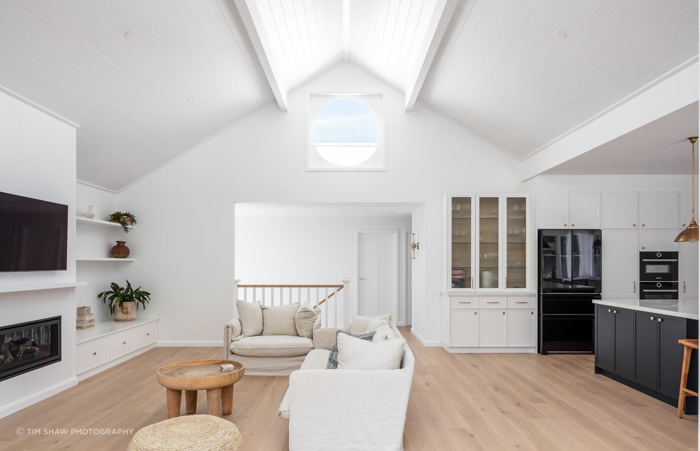 Chasing the sun, the pitched ceiling floods with natural light.