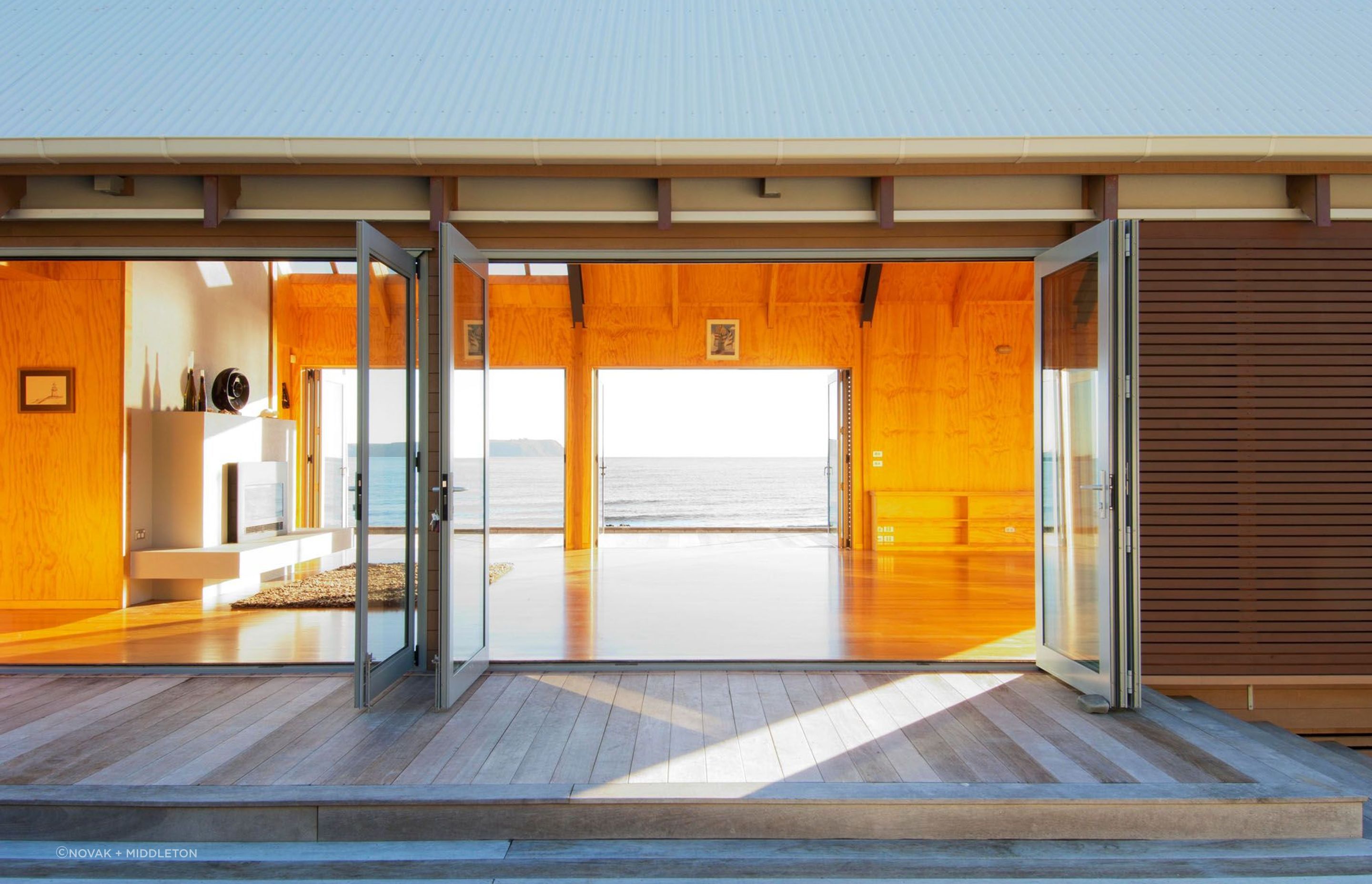 Sliding doors allow the vistas to become part of this tiny home