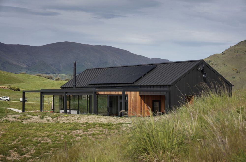Threepwood Residence by Team Green Architects takes in the views and the sunlight, with solar panelling on the roof to reduce energy consumption. Both photographs above by Sam Hartnett.