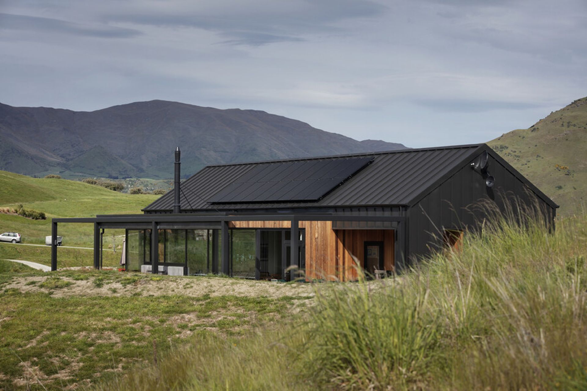 Threepwood Residence by Team Green Architects takes in the views and the sunlight, with solar panelling on the roof to reduce energy consumption. Both photographs above by Sam Hartnett.