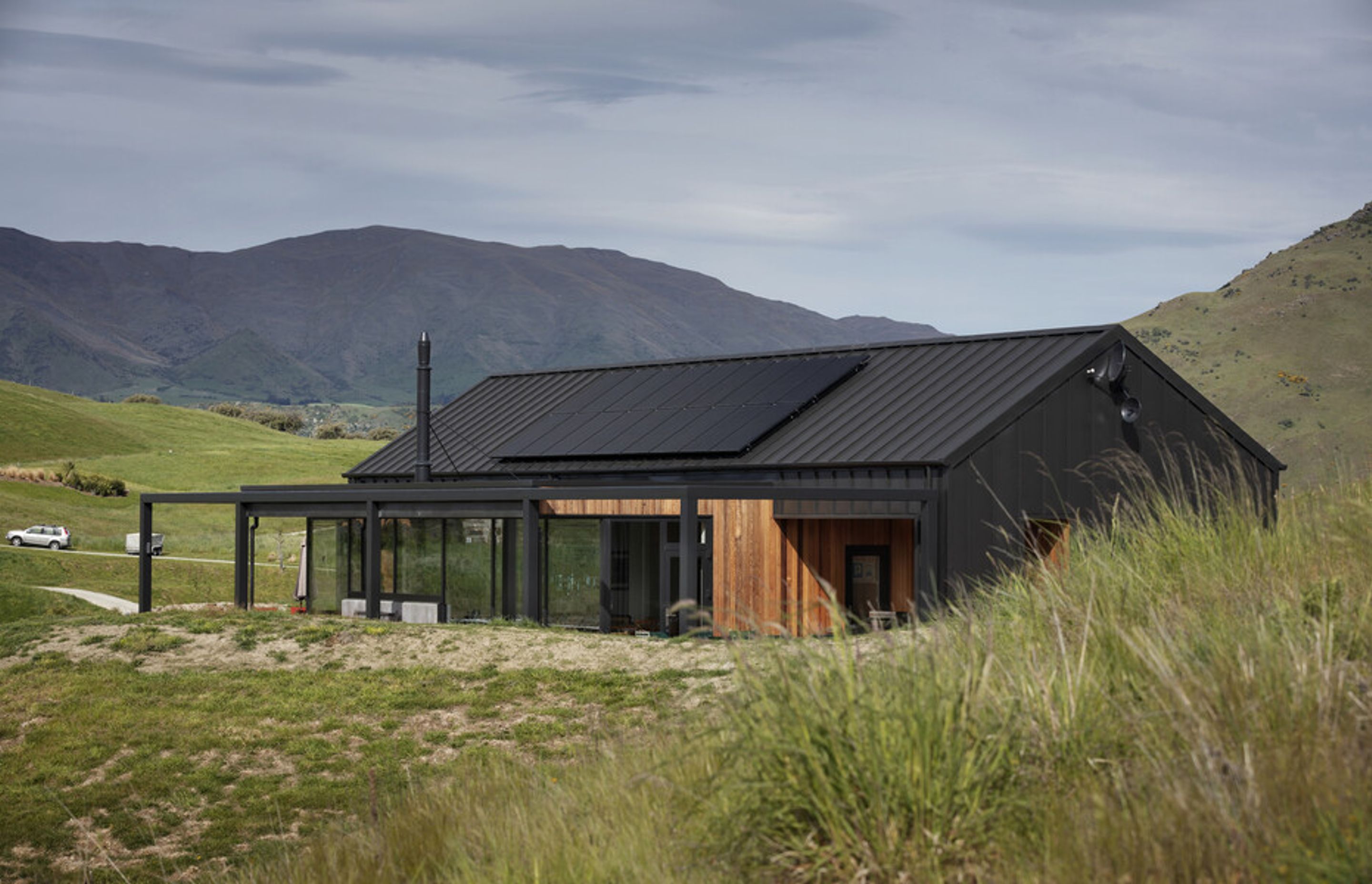 Threepwood Residence by Team Green Architects takes in the views and the sunlight, with solar panelling on the roof to reduce energy consumption. Both photographs above by Sam Hartnett.