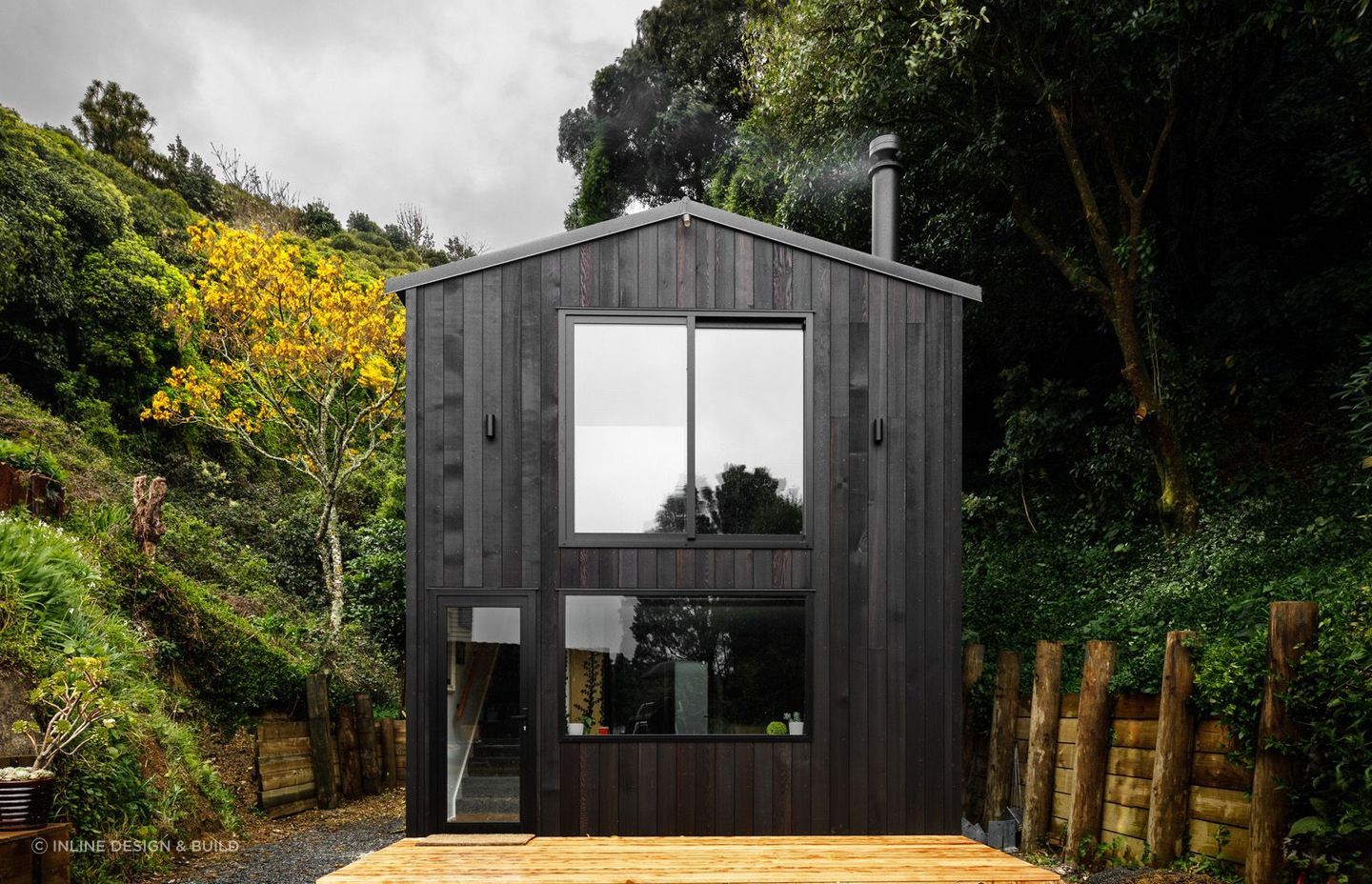 The bold and stylish dark timber exterior of the Vogeltown Tiny Home by Inline Design &amp; Build
