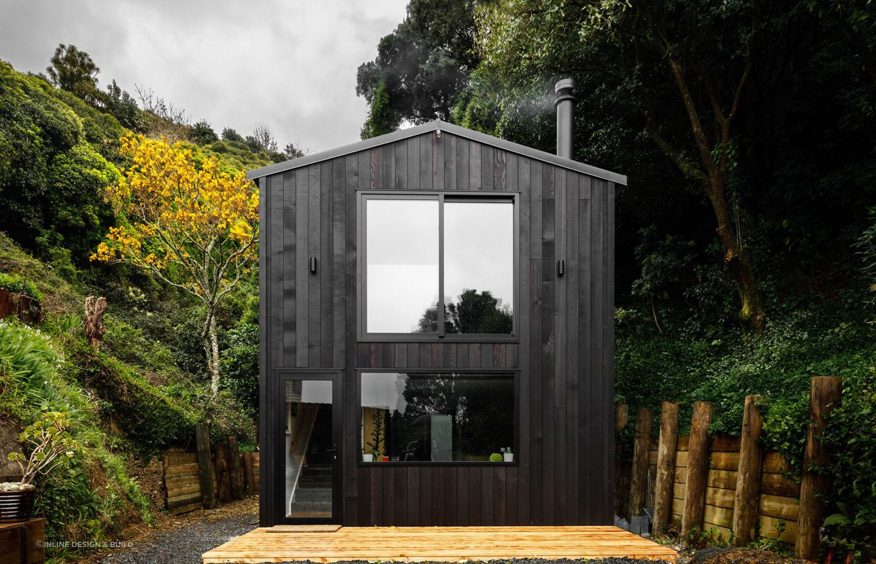 The bold and stylish dark timber exterior of the Vogeltown Tiny Home by Inline Design &amp; Build