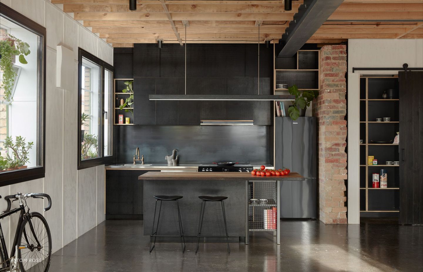 Great care was taken to retain the embodied energy of the structure, celebrating its original form and integrating this into a series of new, functional spaces for a growing family unit. 