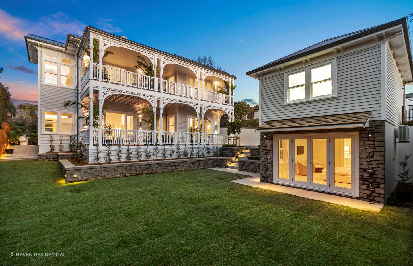 The addition of garden hardscaping, including concrete planters, blends the outdoor space with the surrounding landscape.