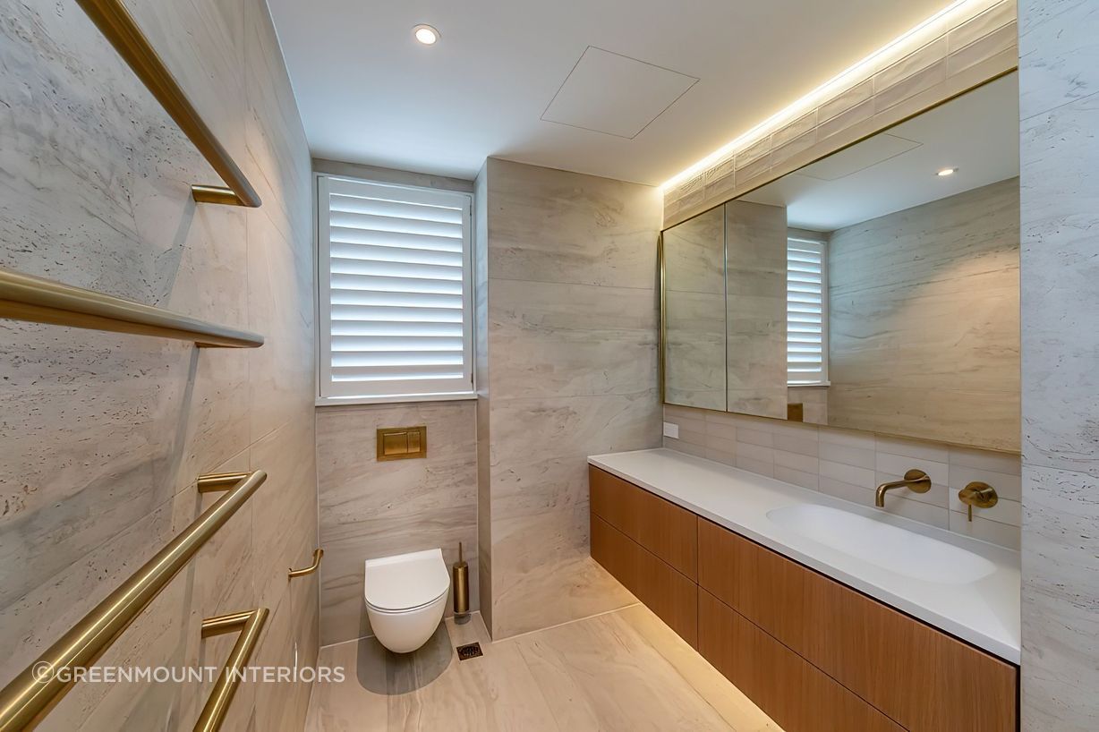 Greenmount Interiors crafted bathroom vanities and mirror units, including Corian tops and basins.