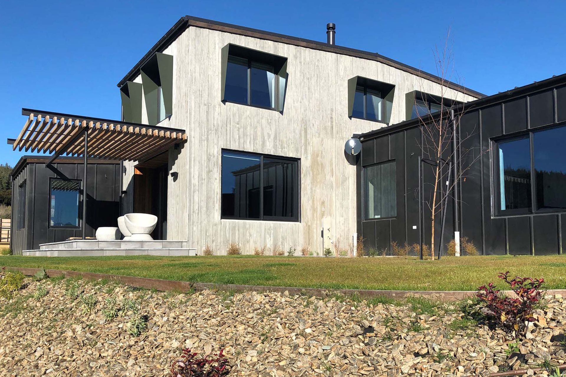 Insulating cladding, like these Thermomass panels from Balcrom, can help improve a building's overall thermal envelope.