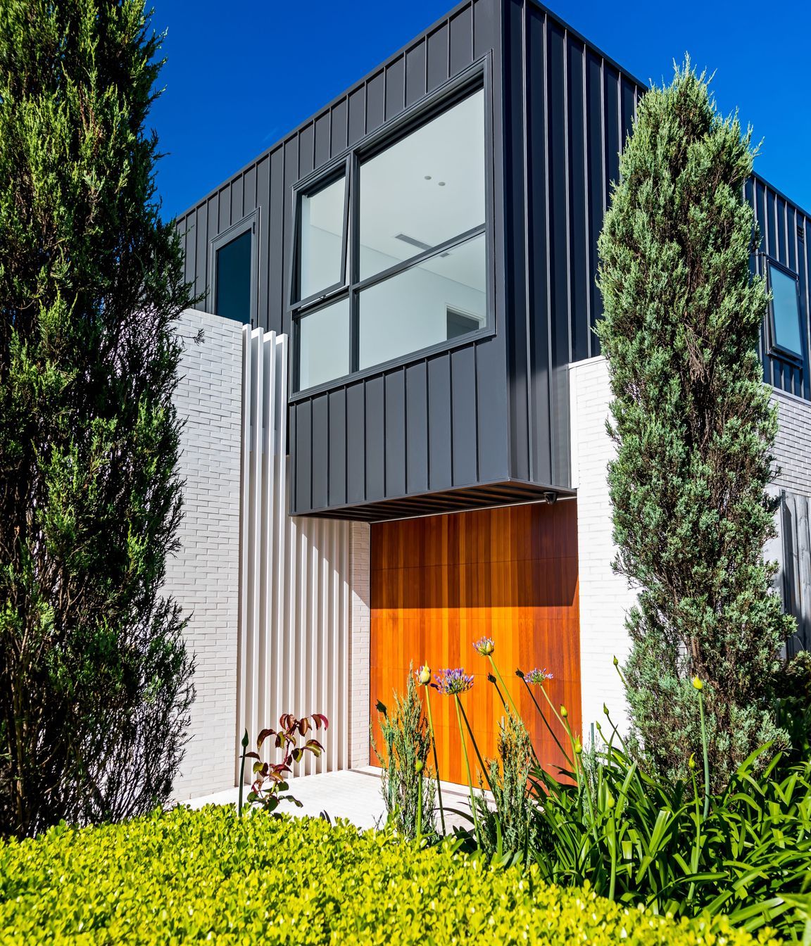 A playful combination of materials highlighting vertical lines