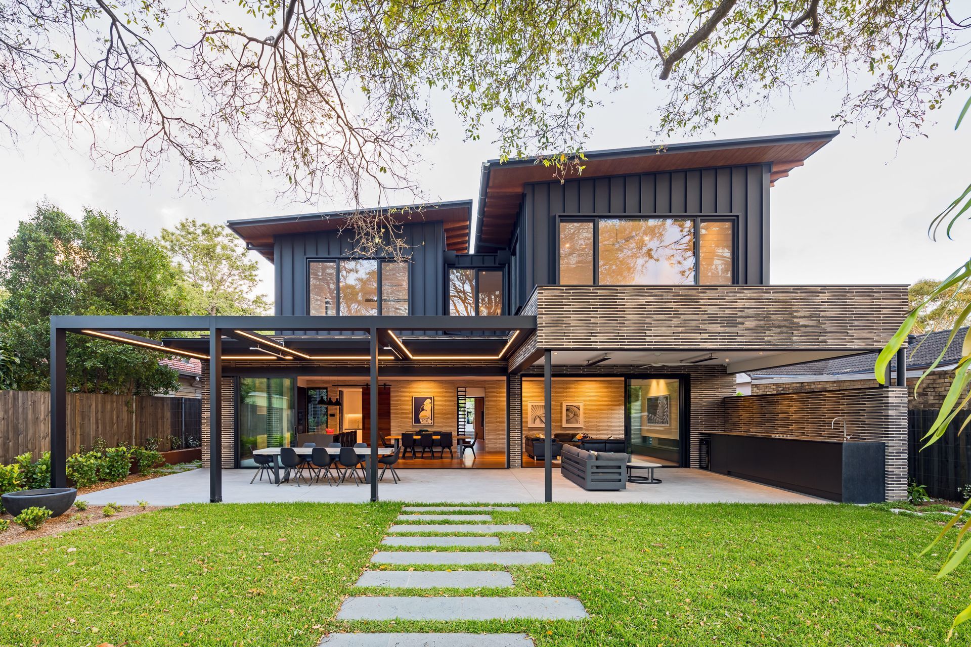 Horizontal and vertical lines elevate the exterior areas of this home