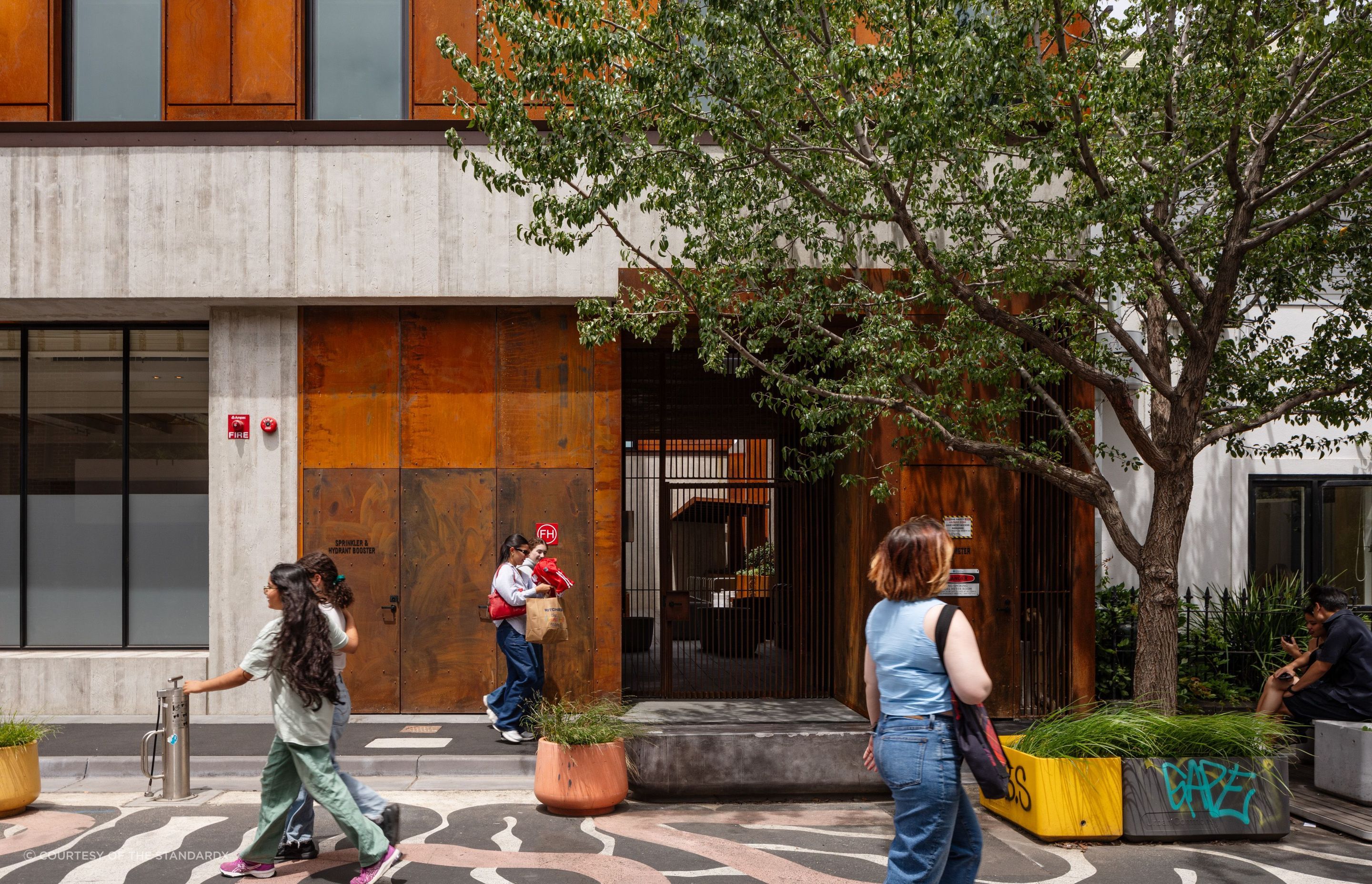The exterior alludes to the idea that the building has always existed in this space, steeped in the fabric of yesteryear.