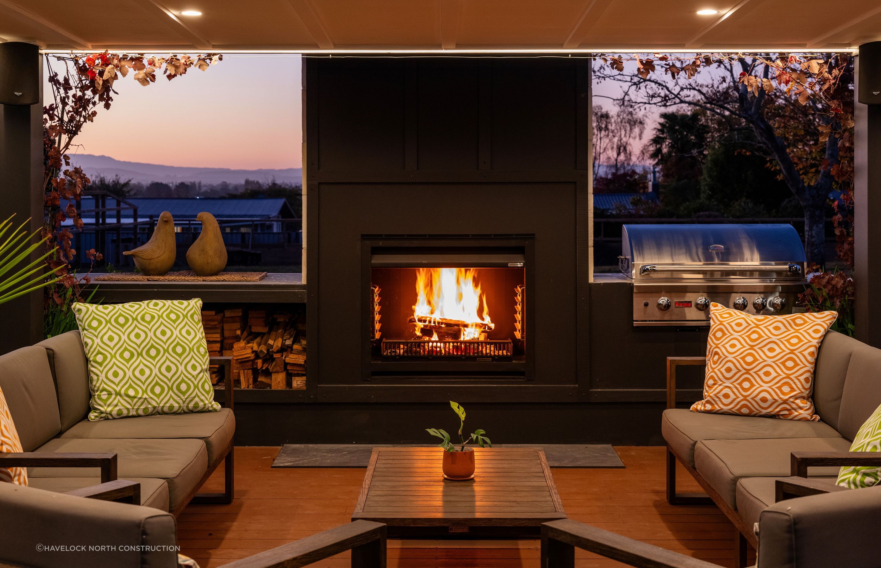 The roaring flame of the open fireplace is the perfect place to host family and friends, taking in the surrounding terrain of Havelock North.