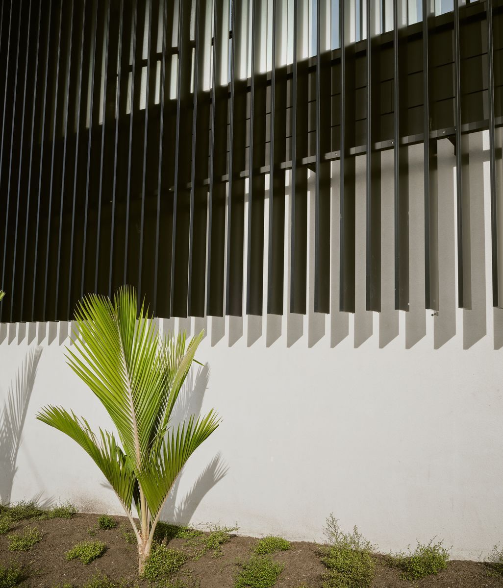 A new louvred facade transforms a 1970s commercial building