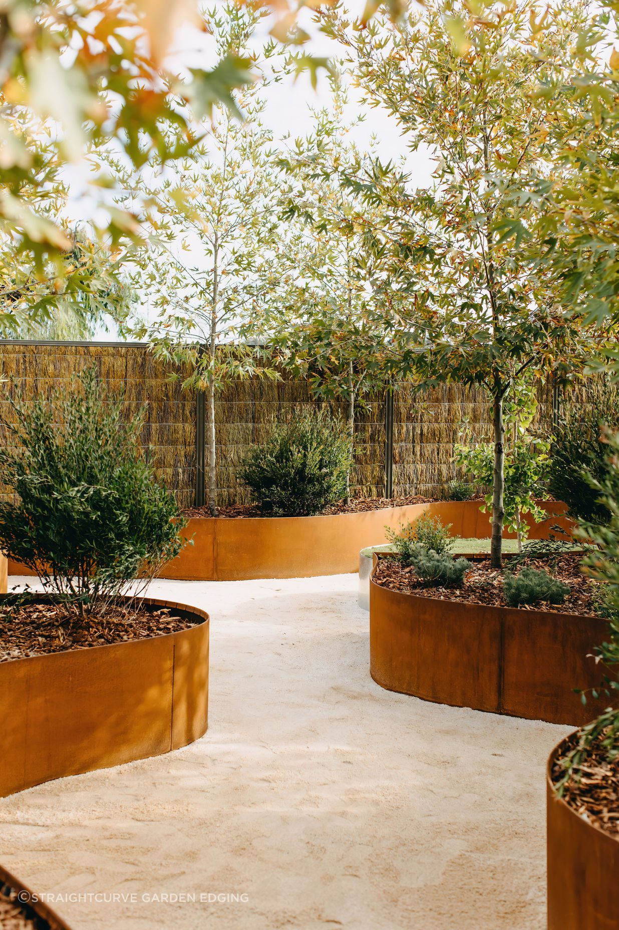Straightcurve Raised Gardens and Retaining Walls allow you to build and brace garden beds and walls into soil and hard surfaces, or connect them to each other.