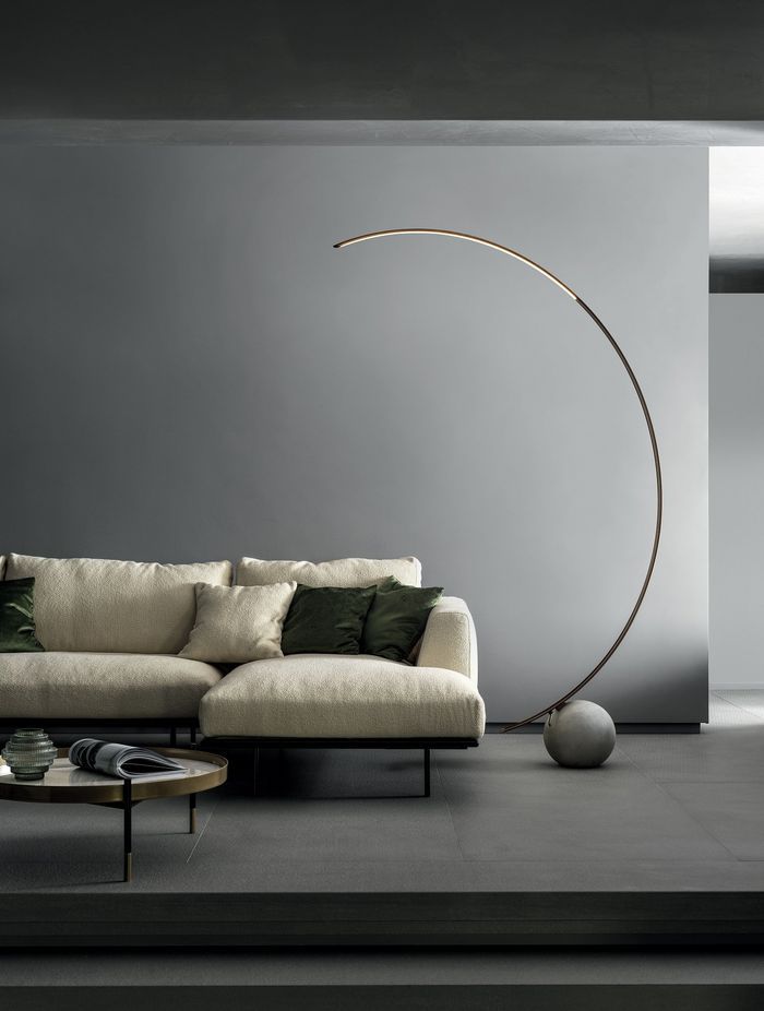 The stylish and distinctive Circle Floor Lamp can easily act as a statement piece in a room.