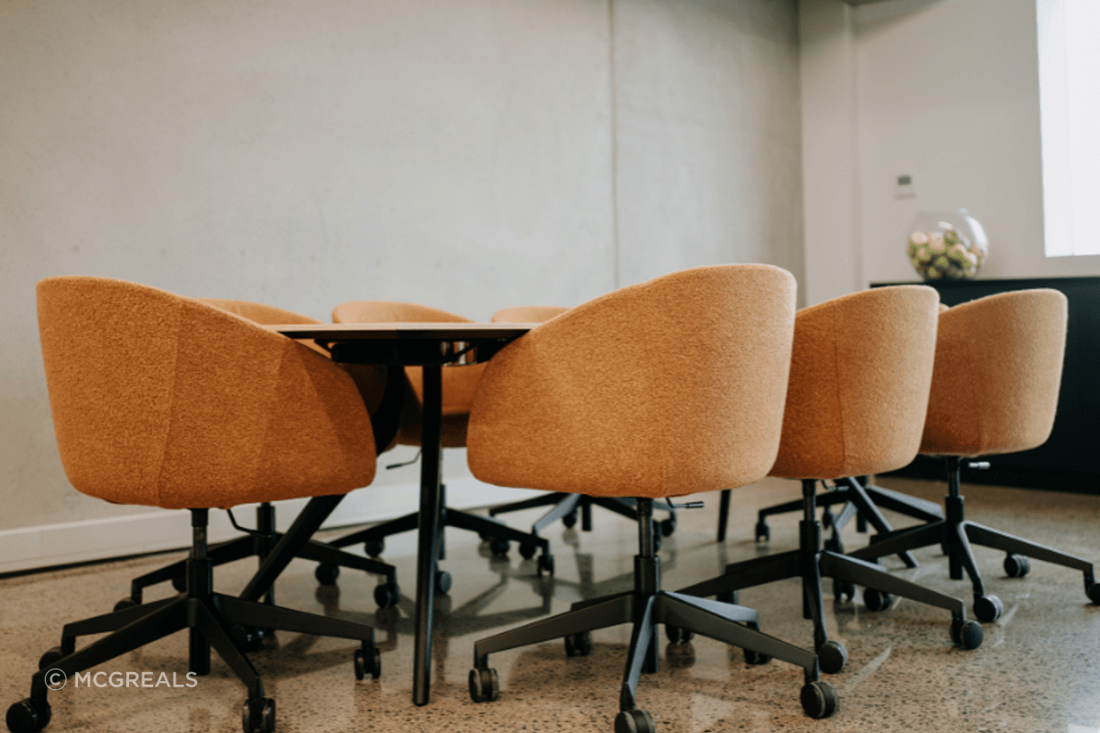 McGreals custom-upholstered Amelia chairs.