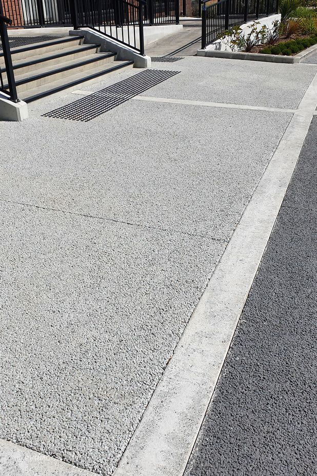 "There’s huge synergy in using permeable pavements alongside rain gardens, particularly in car parking bays. It helps filter pollutants before water reaches the rain gardens, reducing their load and improving stormwater management."