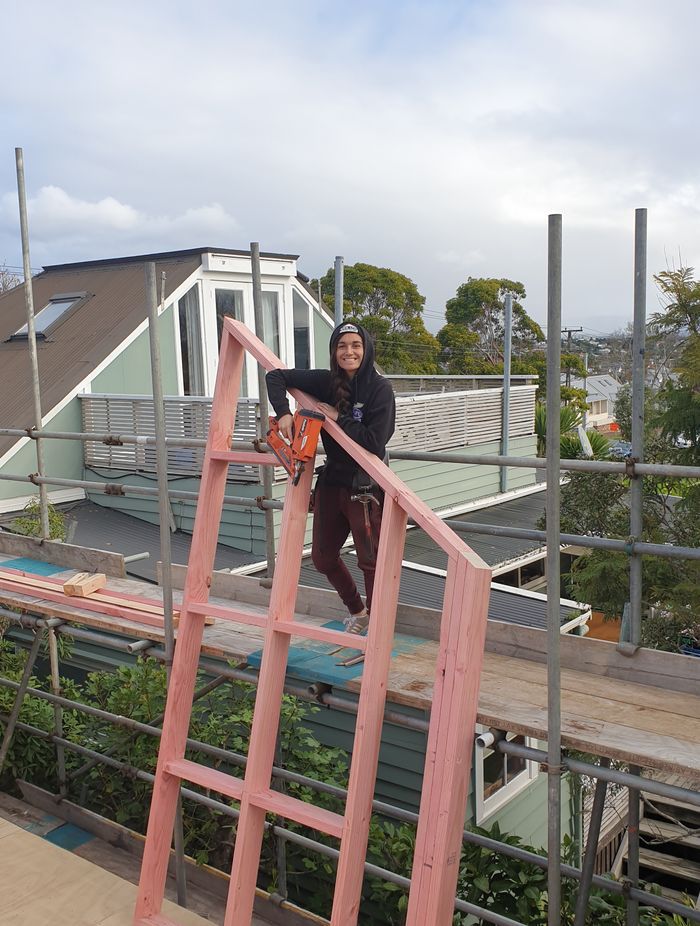 Bex on the tools on a building site.