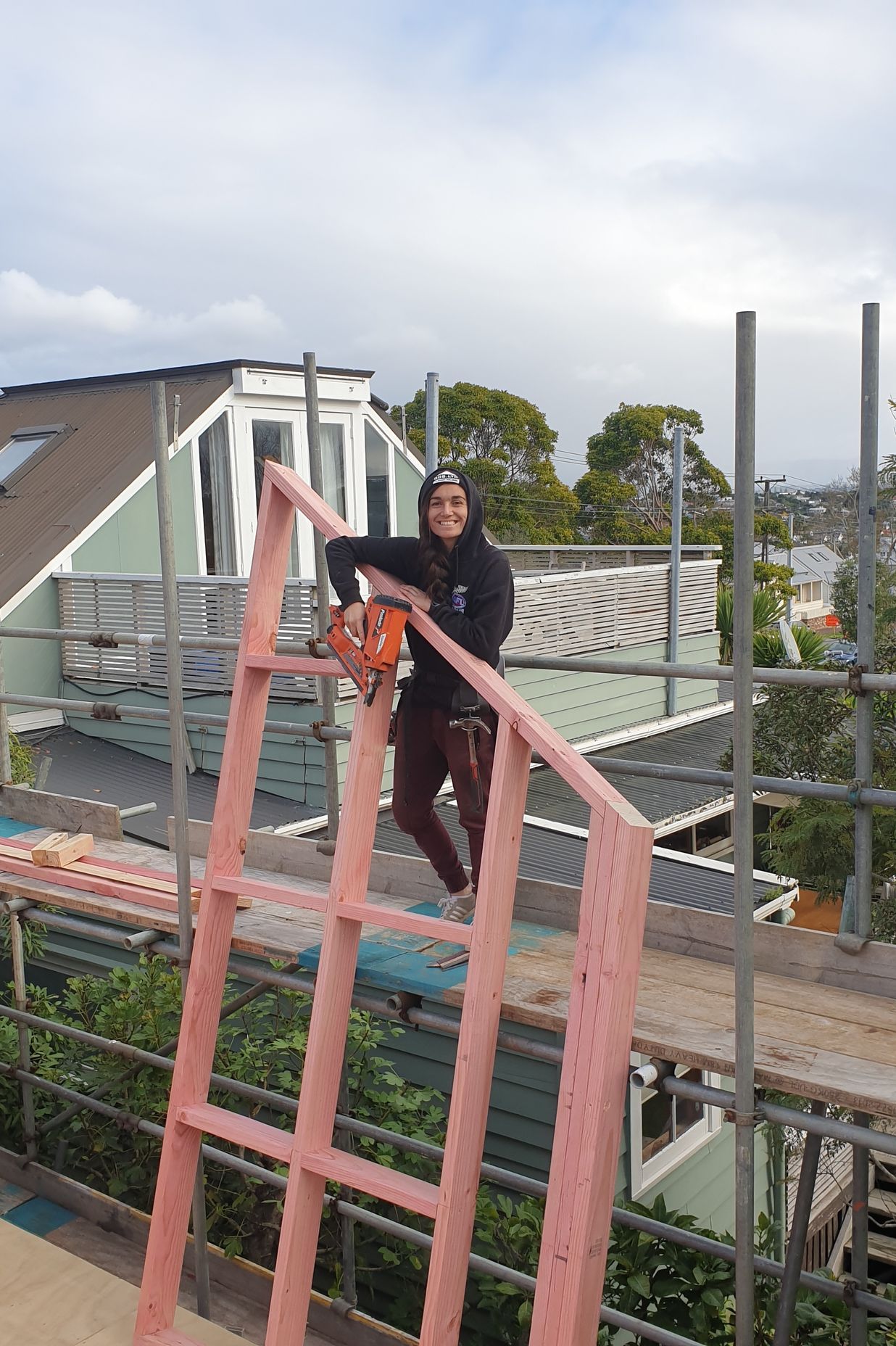 Bex on the tools on a building site.