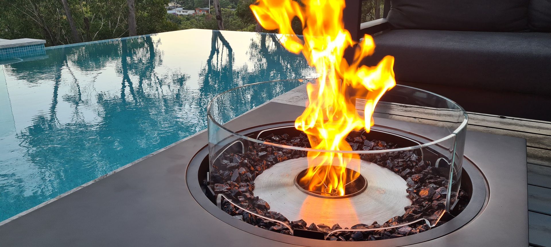 The ambience of the Ecosmart Ethanol Tequila Fire Table in 'Natural' is second to none for your outdoor space