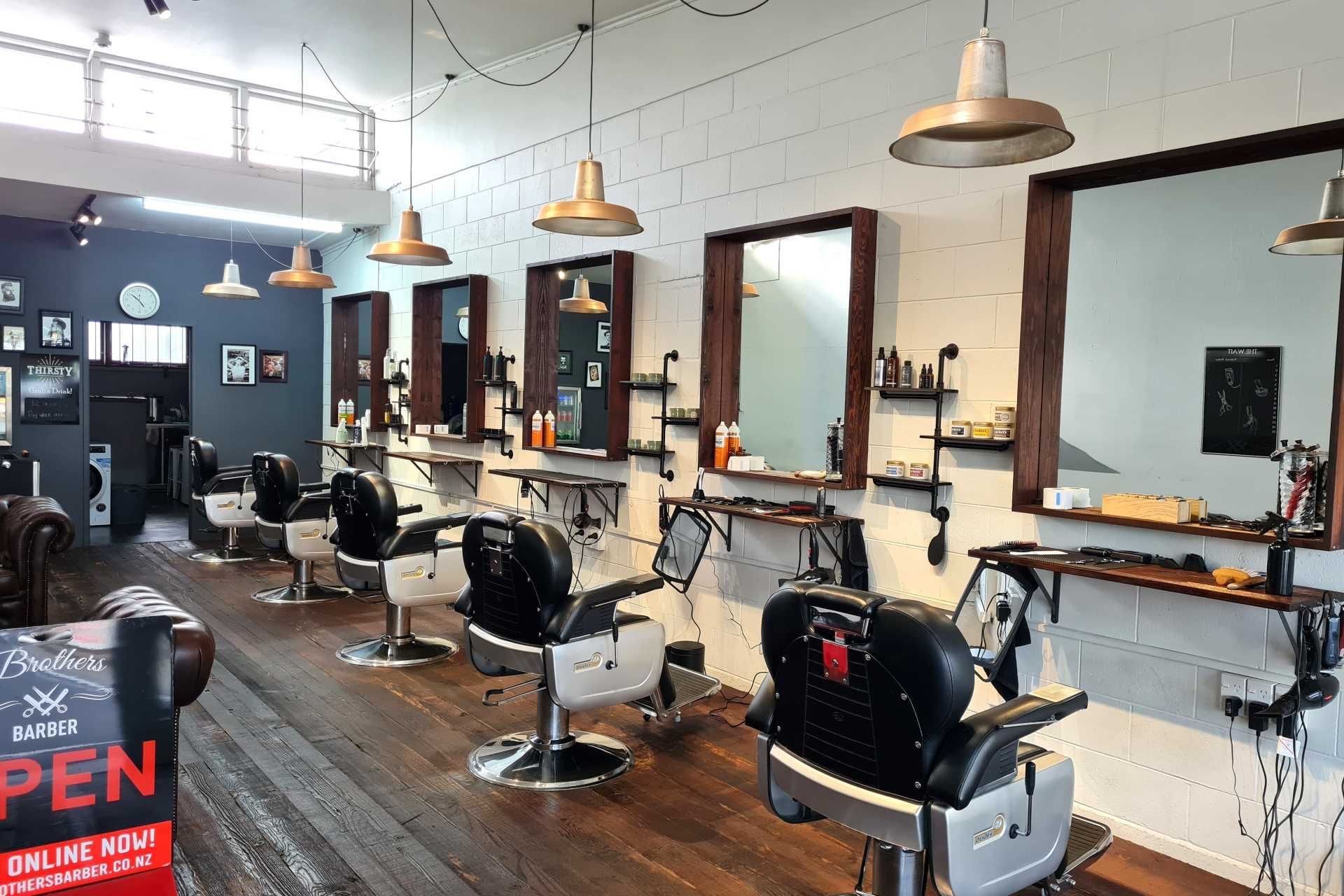 Brothers Barber used wall shelving units for a masculine aesthetic.