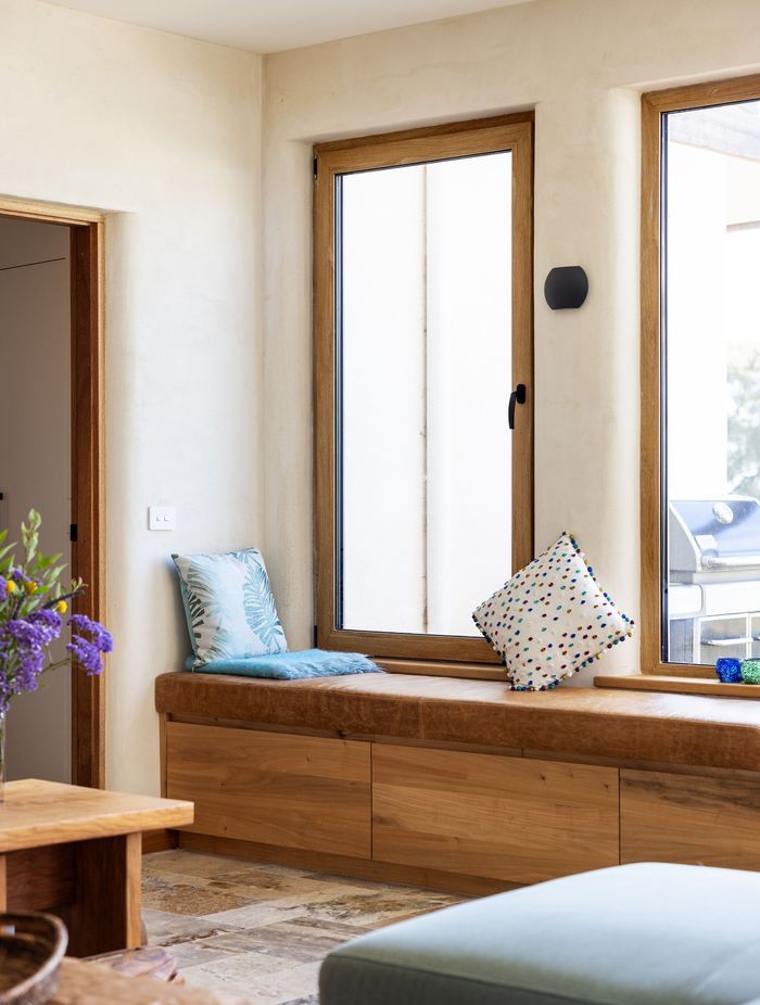 Turner Oak Malt frames' timber-like appearance complements the organic palette.