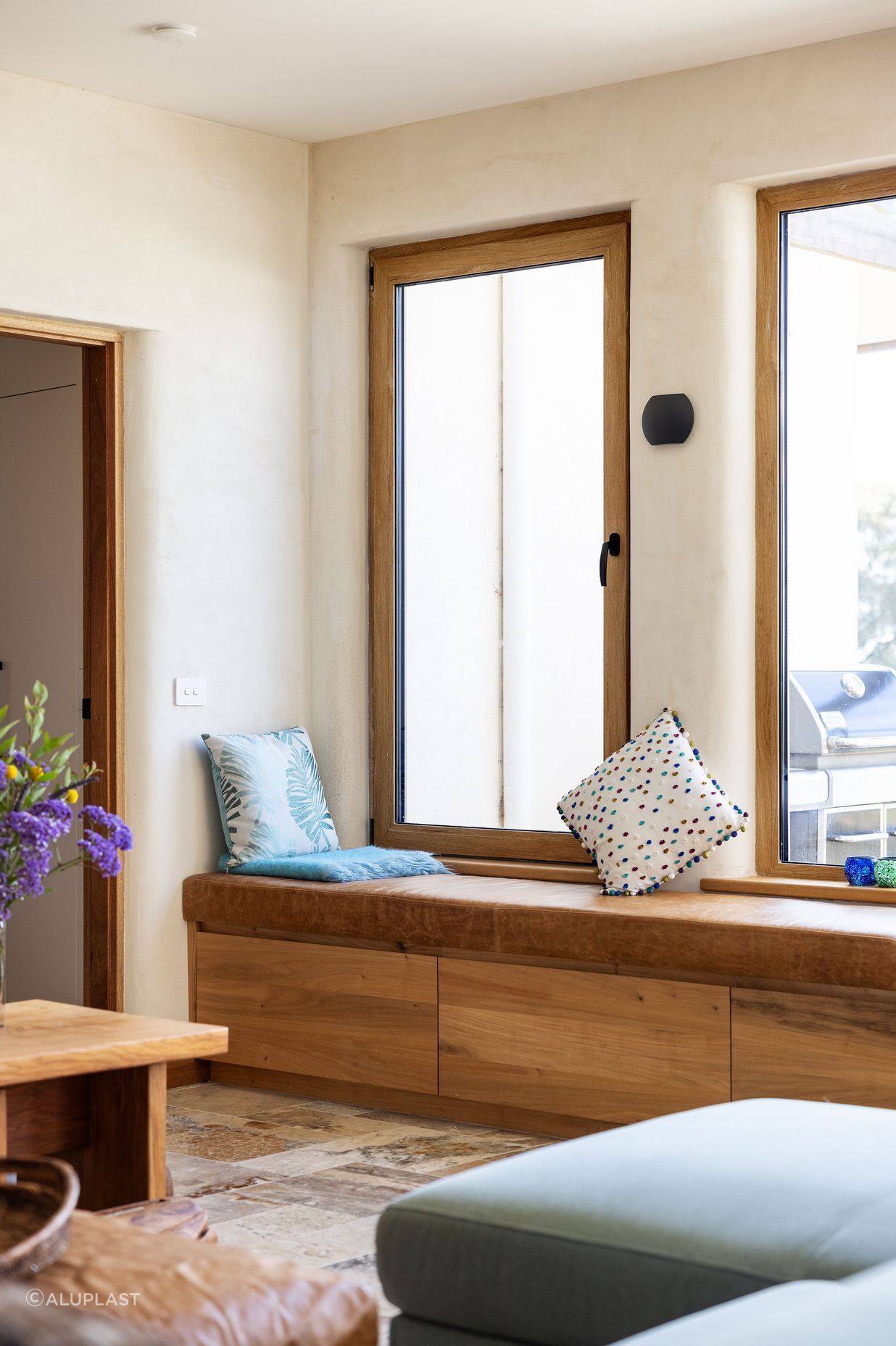 Turner Oak Malt frames' timber-like appearance complements the organic palette.