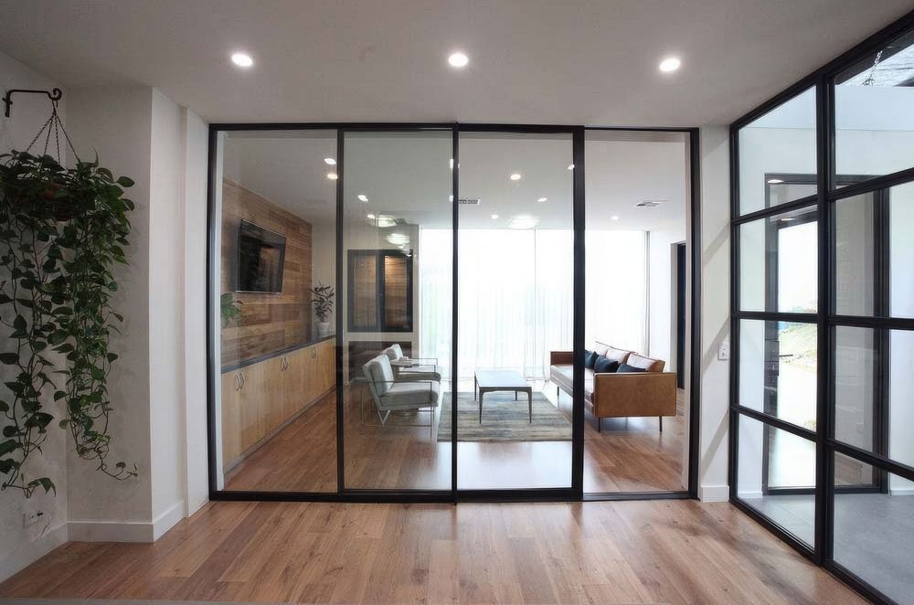 Vertical sliding windows are double-glazed, meeting New Zealand's H1 Standards.