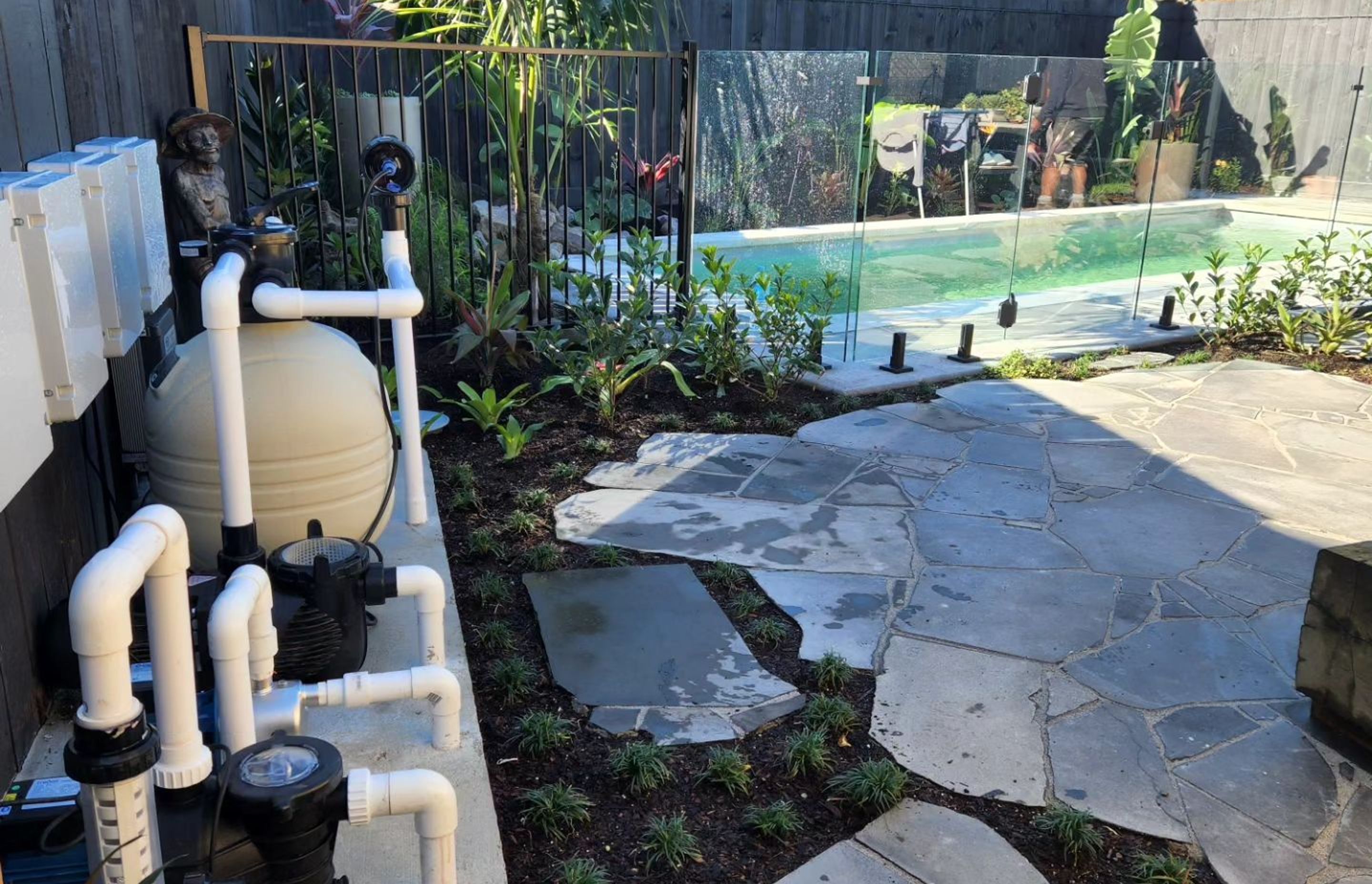Without a pool pump cover, the pump is unsightly and unprotected.