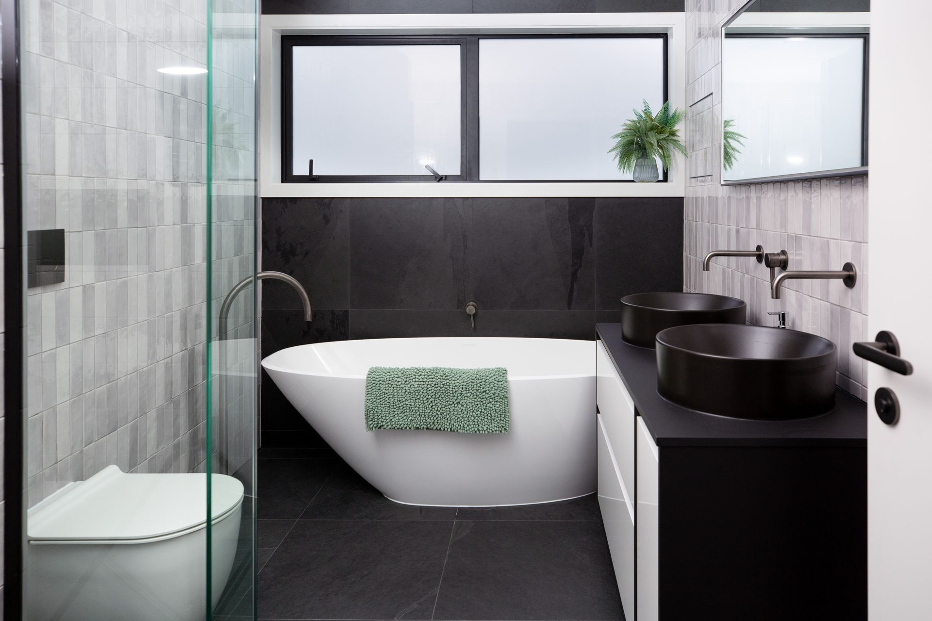 The kid's bathroom at this Matara Ave home shows the difference a quality bath mat can make to styling - Photography: MK Photography