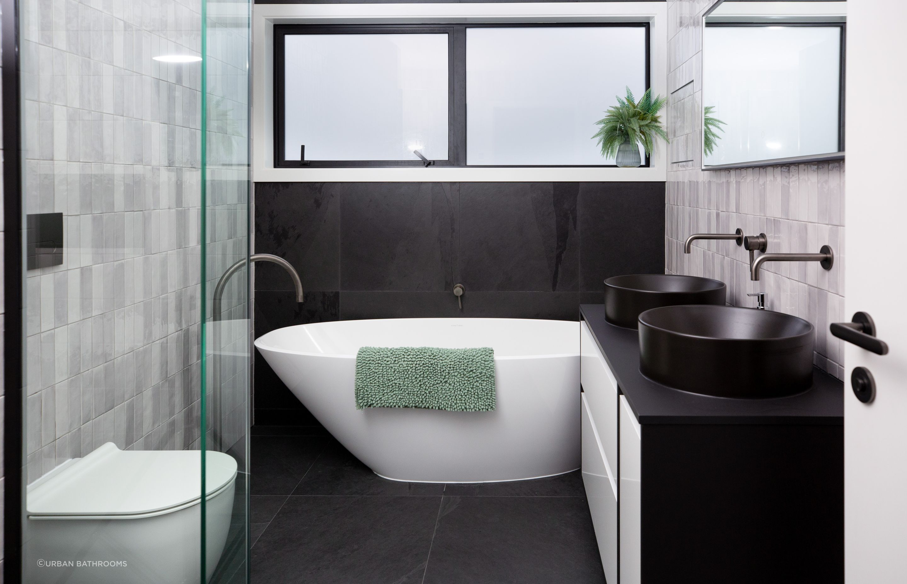 The kid's bathroom at this Matara Ave home shows the difference a quality bath mat can make to styling - Photography: MK Photography