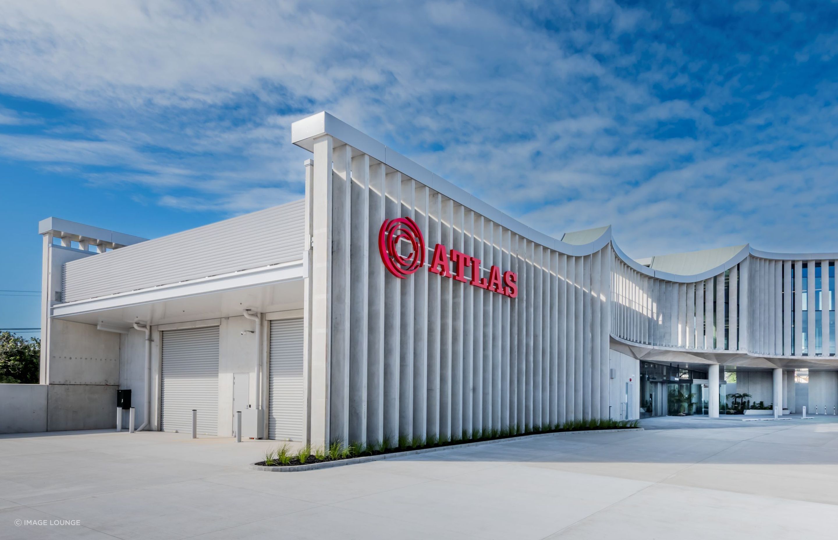 The design brief was to explore the efficient use of the site, replacing an existing retail office with a new
headquarters that consolidates Atlas Concrete's trade retail, warehouse, and office into an integrated facility. This unified approach brings the team together in a collaborative environment while serving as a showcase of Greenstone LCC.