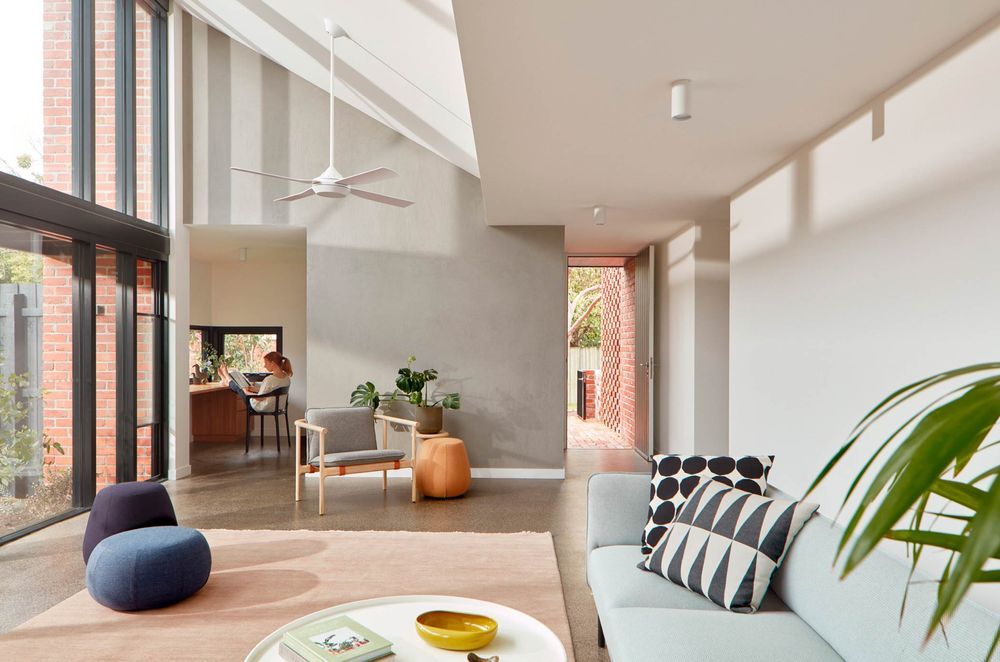 Large glass panels wash the living space with natural light - Photography: Tom Ross