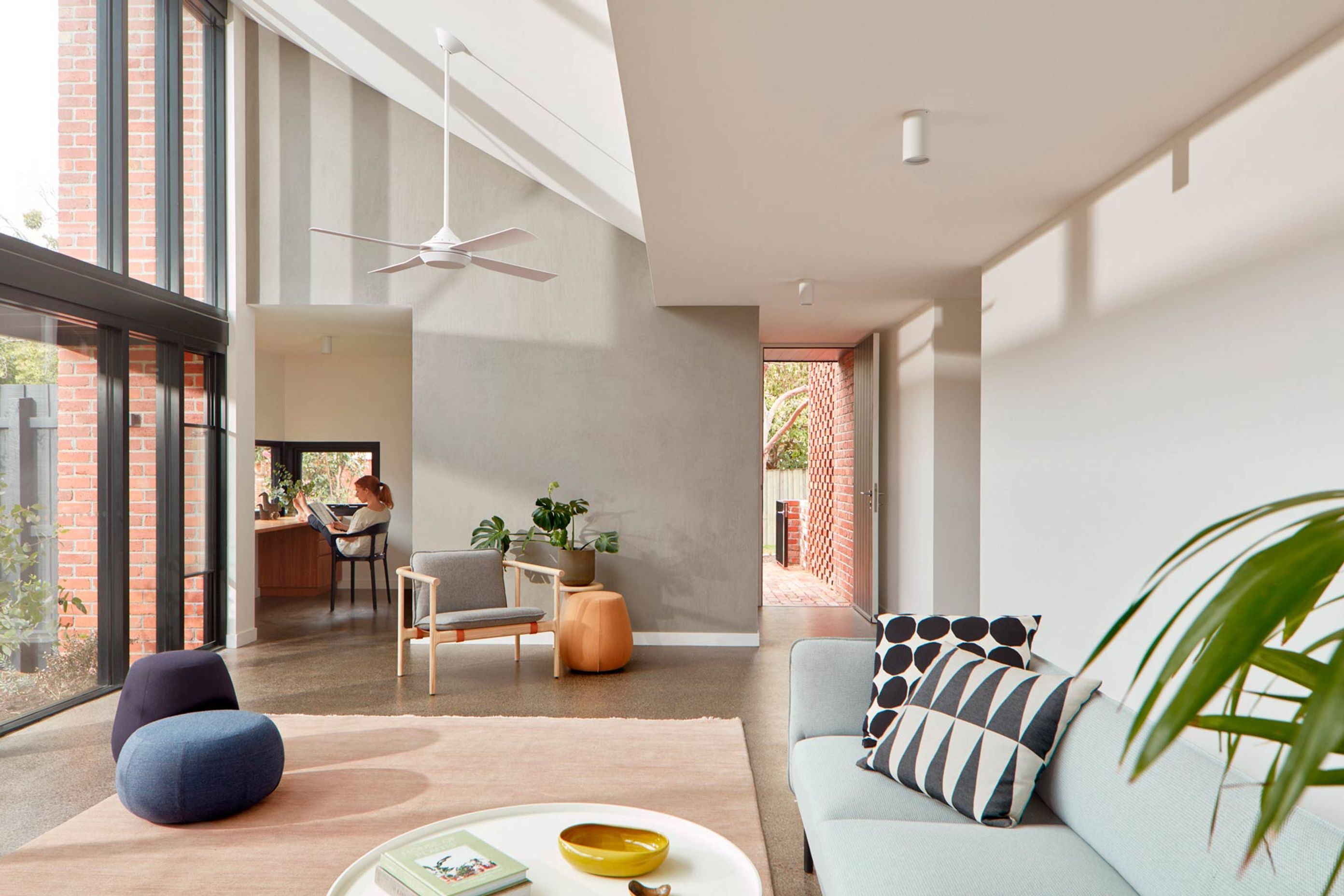 Large glass panels wash the living space with natural light - Photography: Tom Ross