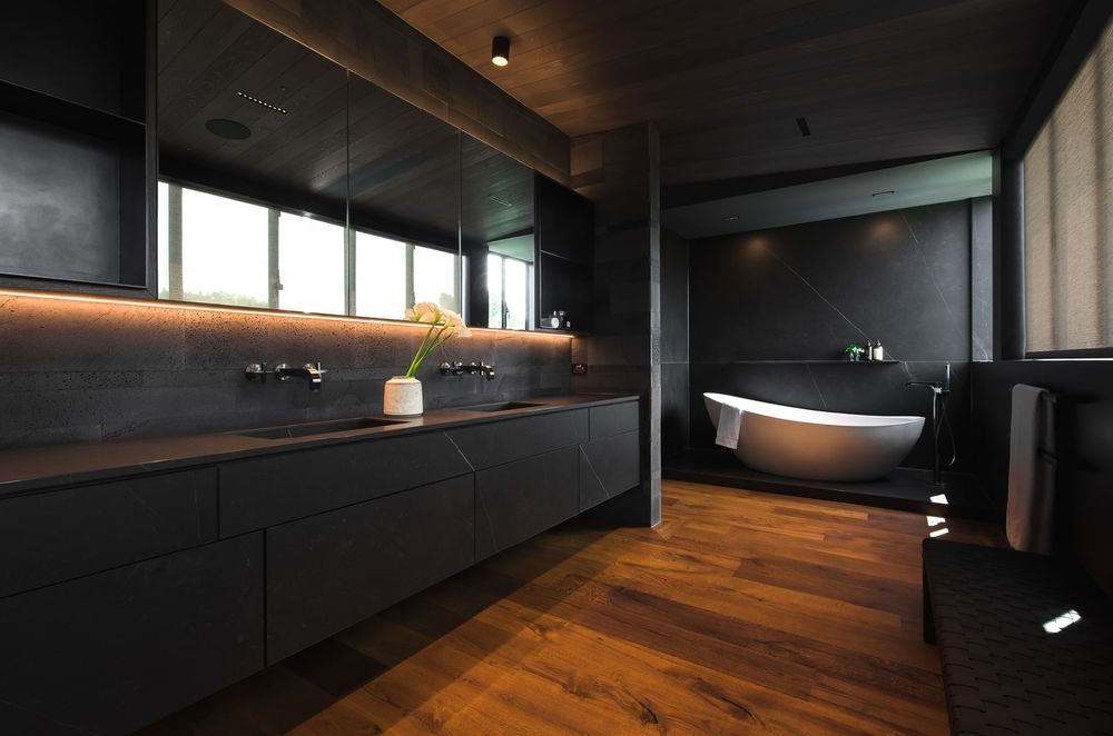 Controlled lighting allows you to set the mood with style with no shortage of it in this sublime bathroom in a Parnell home