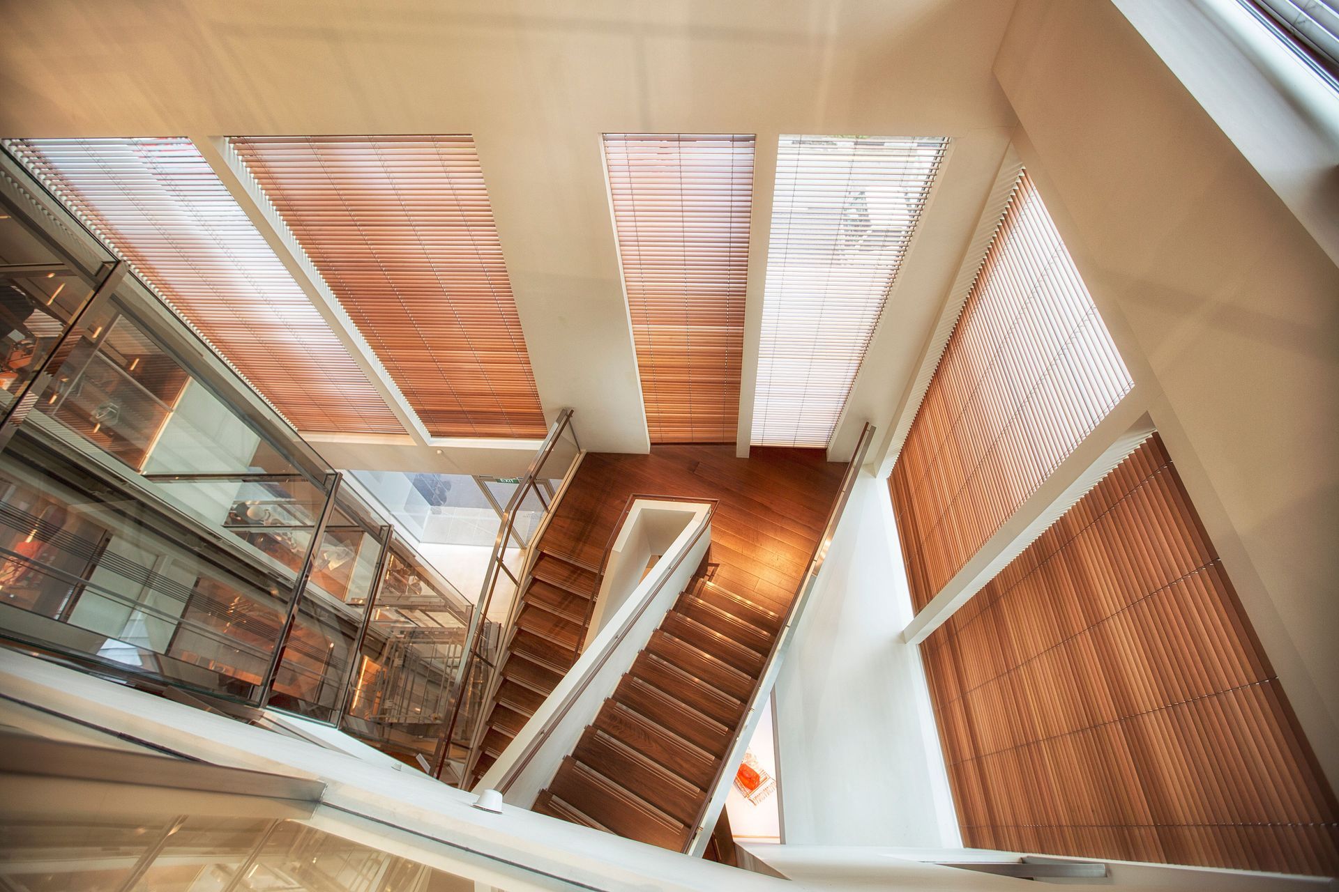 The Hermès store in Singapore featuring 34 motorised cedar Venetian blinds with drops up to 4.5 metres | Vertilux