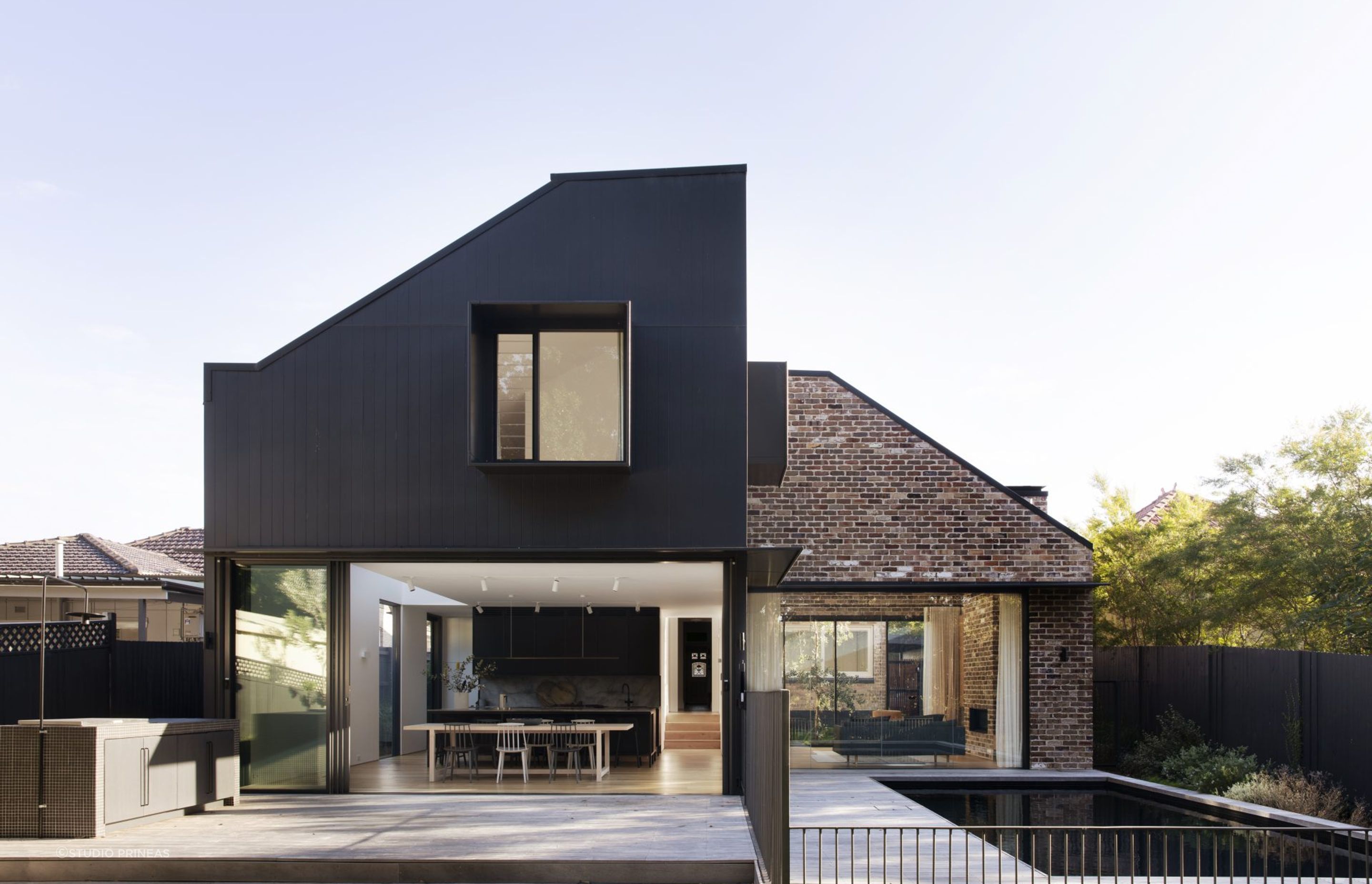The brick cladding and dark timber of Cnr Virginia work so well as complementary choices - Photography: Chris Warnes
