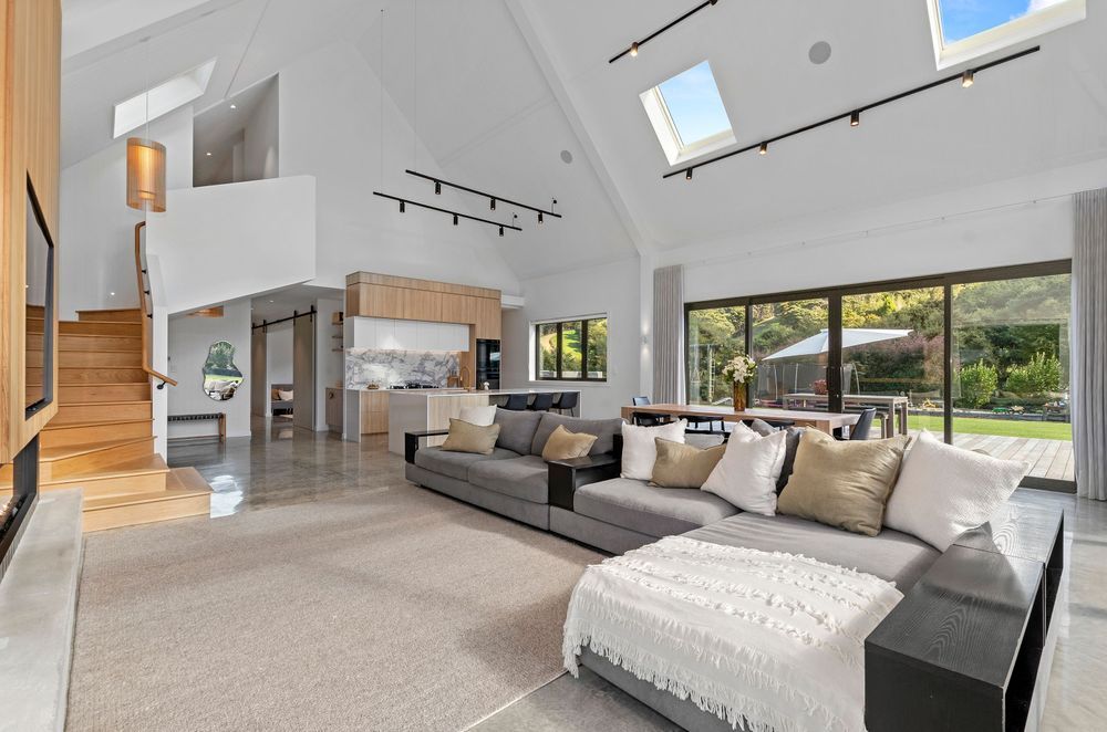The timber stairs lead from the living area into the more private 'family zone' upstairs.