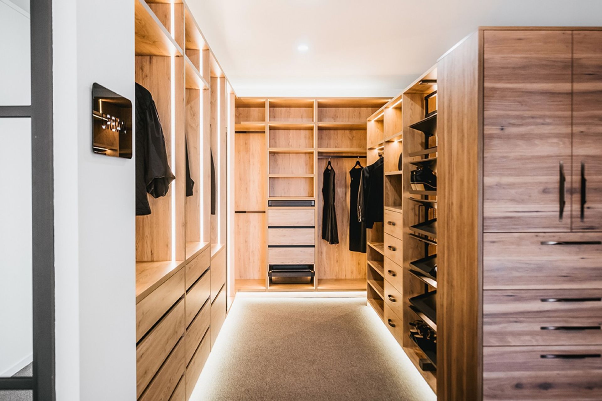 Pull-out shoe drawers with a metal tilt offer a sleek and discreet storage solution when optimising space and keeping shoes out of sight.