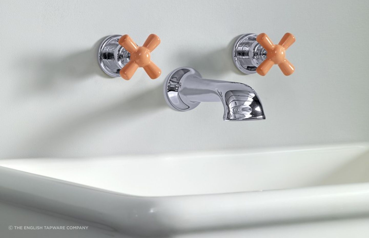 Super trendy meets traditional with Rockwell Tapware - The Water Monopoly featuring squash orange ceramic handles
