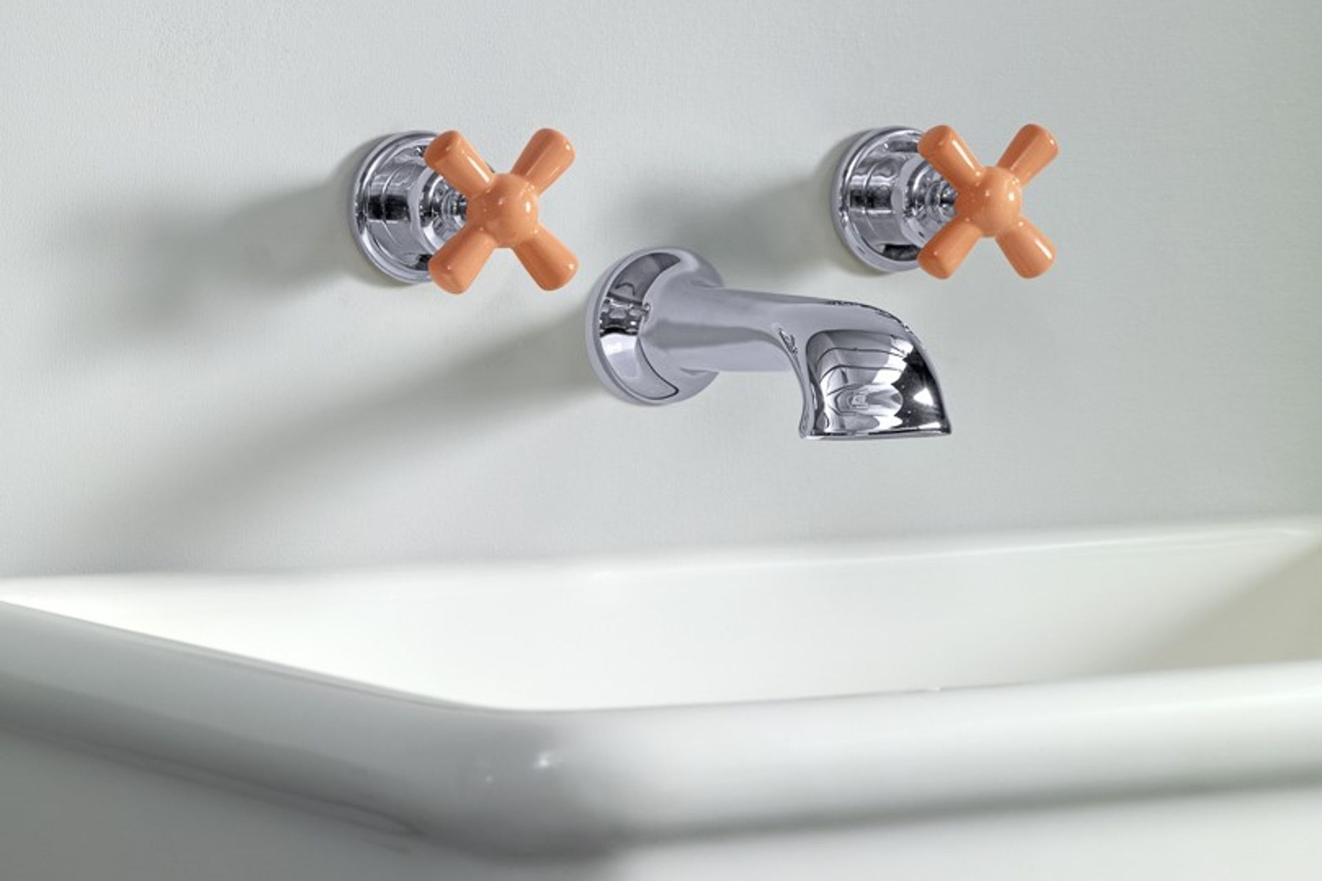 Super trendy meets traditional with Rockwell Tapware - The Water Monopoly featuring squash orange ceramic handles