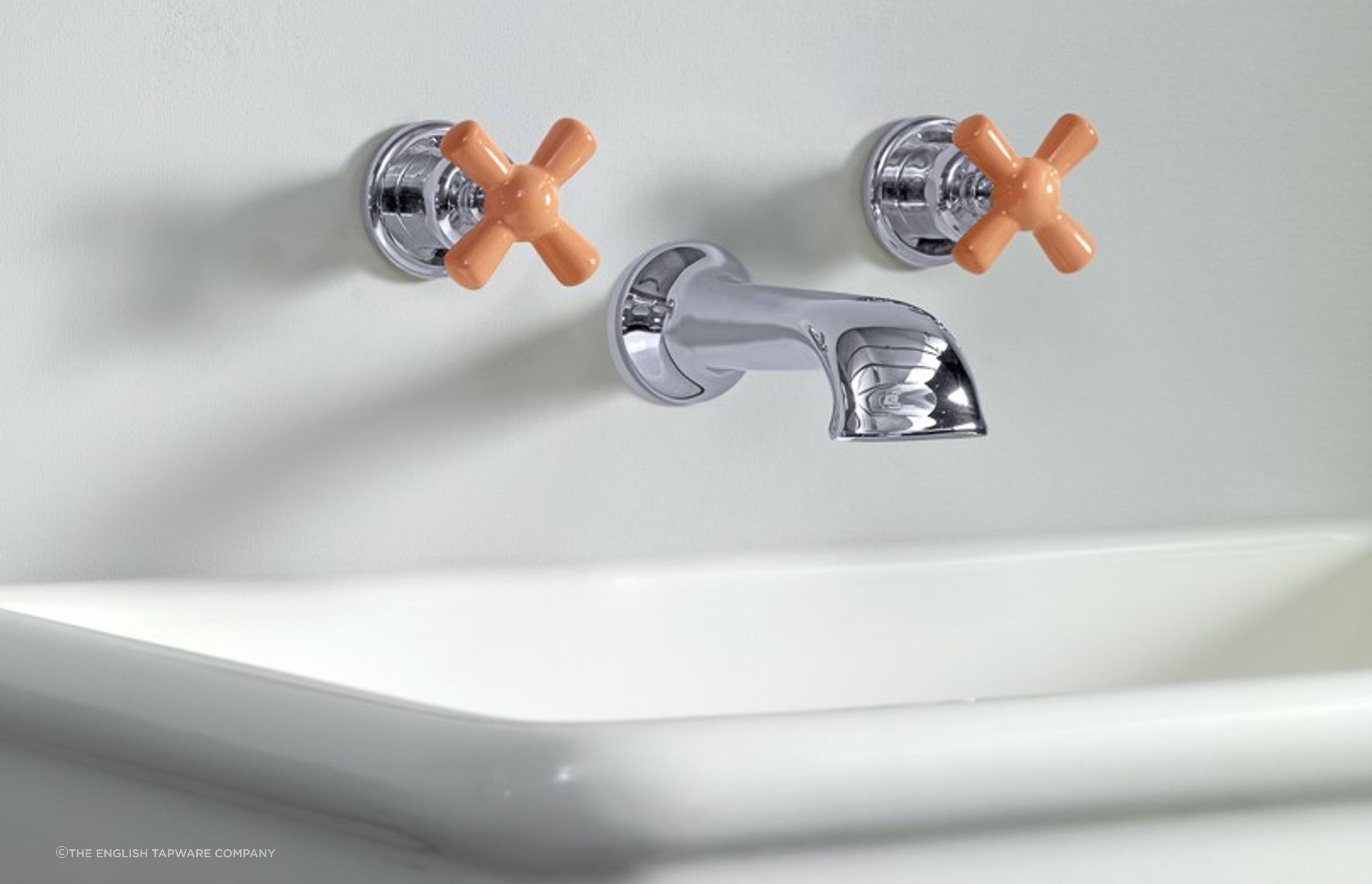 Super trendy meets traditional with Rockwell Tapware - The Water Monopoly featuring squash orange ceramic handles