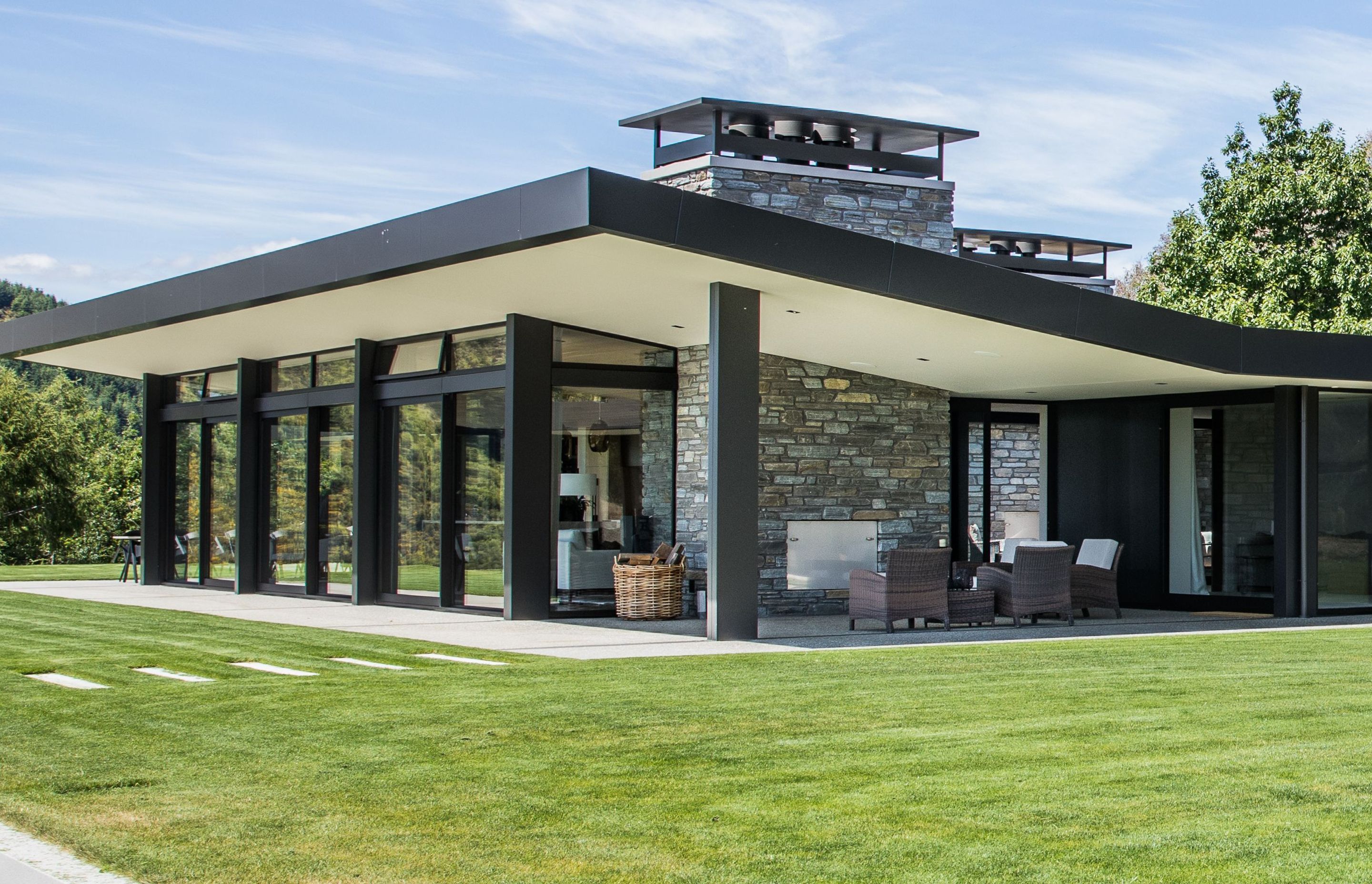 This home was clad with a blend of Wanaka Stone's Poolburn Grey and Cluden Grey stone.