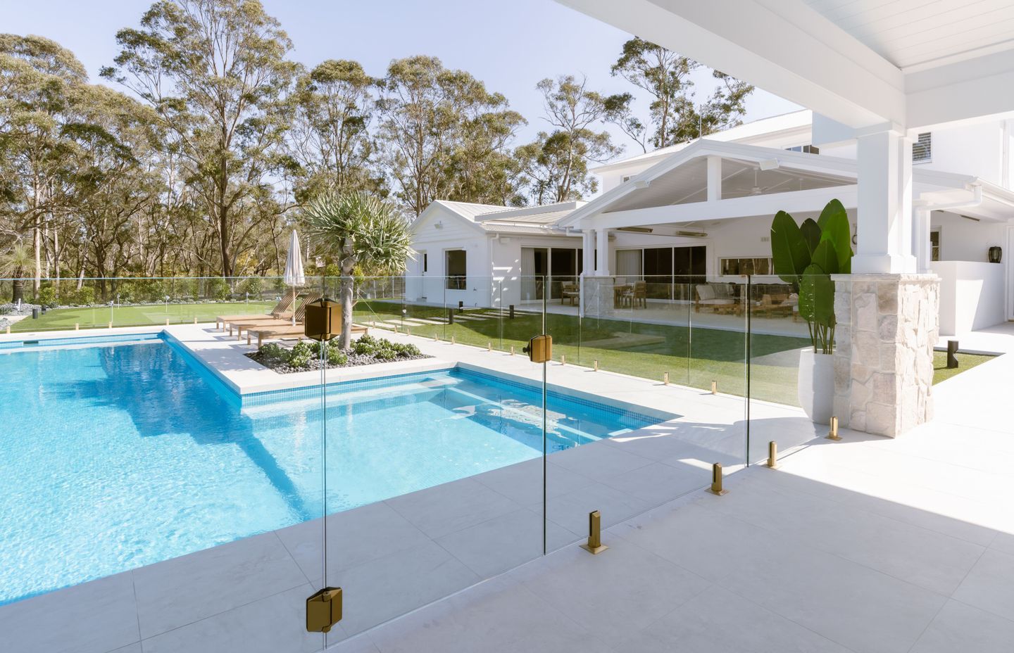 Brass hardware was chosen, further elevating the look of the pool space.
