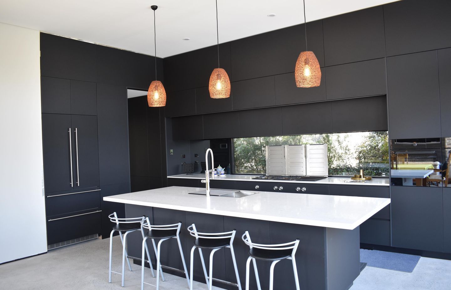 Anti-fingerprint black kitchen by JPC Kitchens