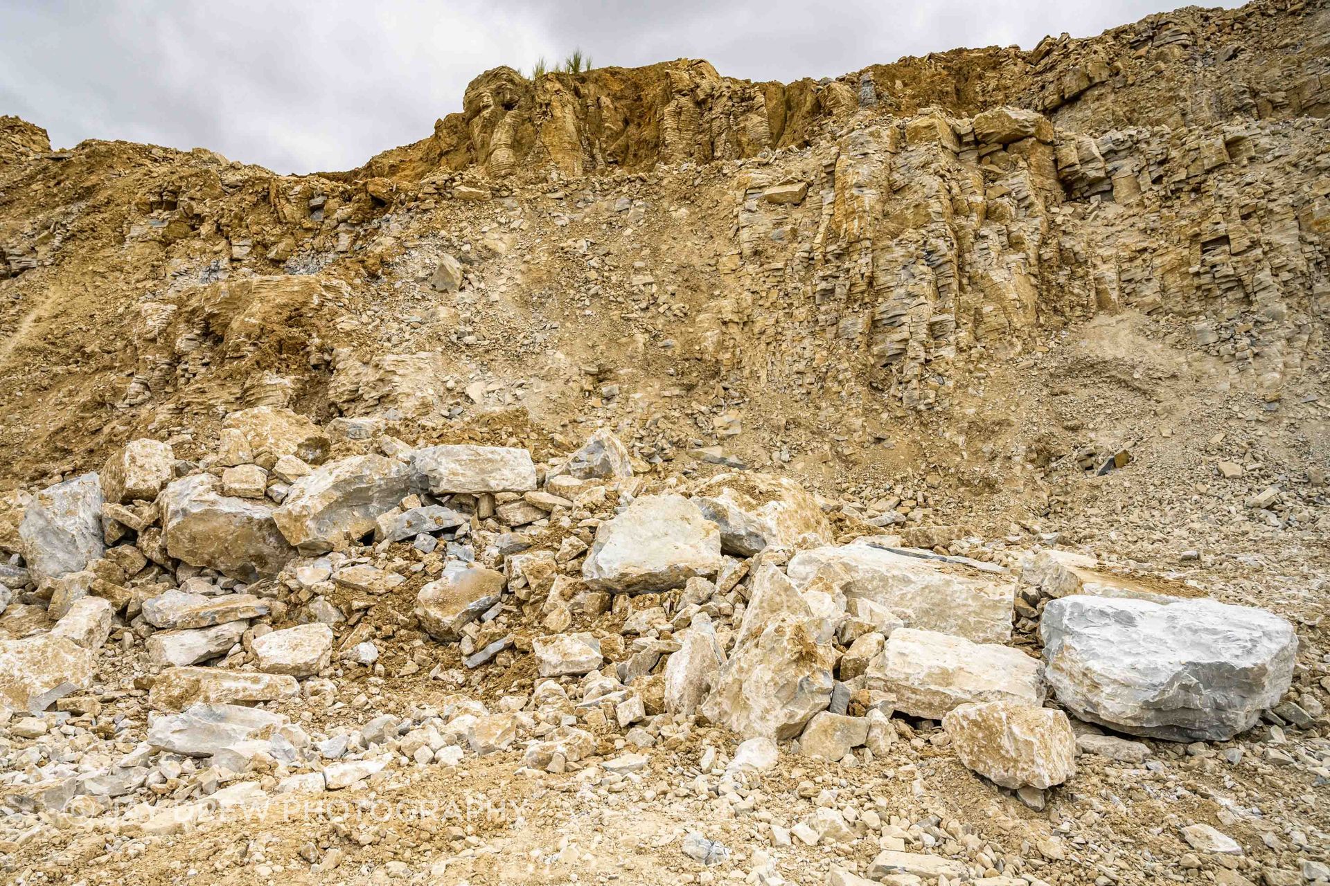 Aria limestone at a quarry, where The Natural Stone Co. begins to understand the tone, texture and scale of the material before it is shaped into cladding, paving or bespoke architectural elements.