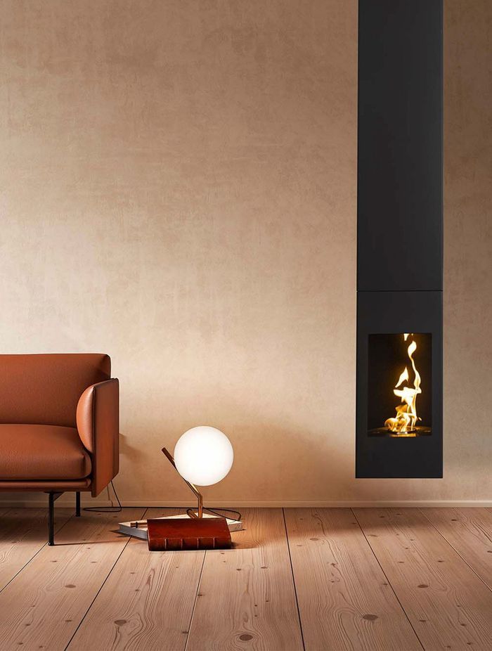The Aurora 'Evolve' suspended fireplace carries the minimality of the interior's aesthetic